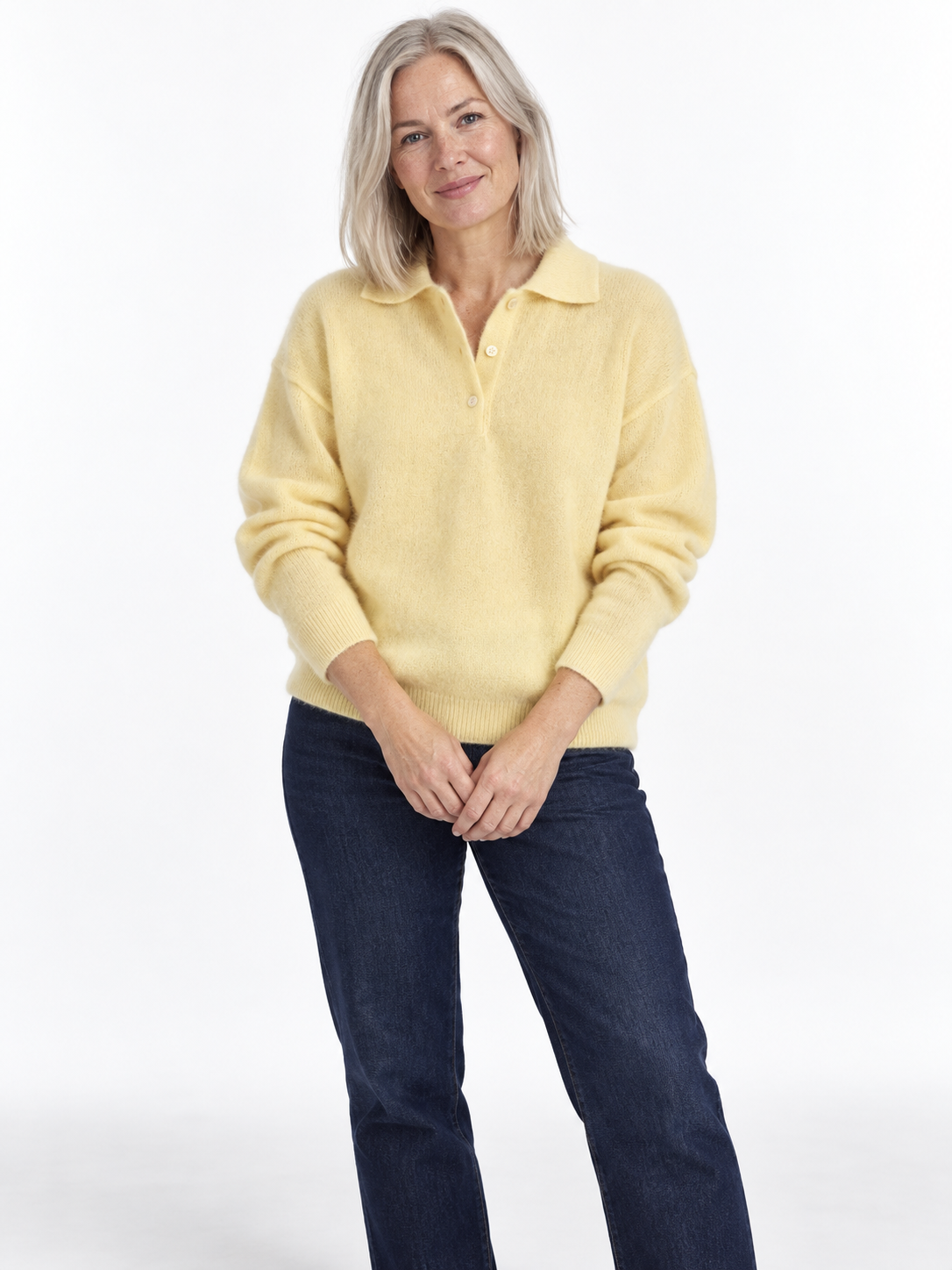 Pale yellow Merino Polo Knit Sweater shown on a model